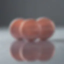 A close-up view of metronidazole tablets on a reflective surface