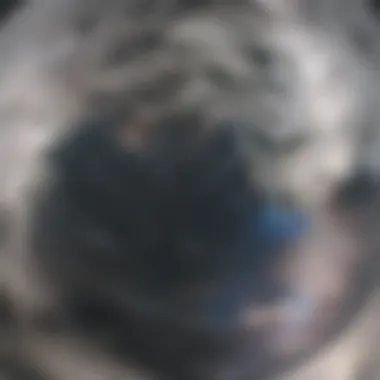 Close-Up of Lunar Surface Lunar surface with intricate details observed through telescope