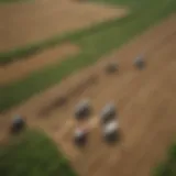 Aerial view of sprawling agricultural fields showcasing modern farming techniques.